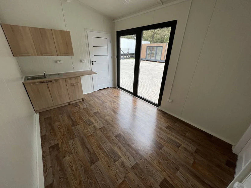 Contenedor de oficina residencial de 24 m2