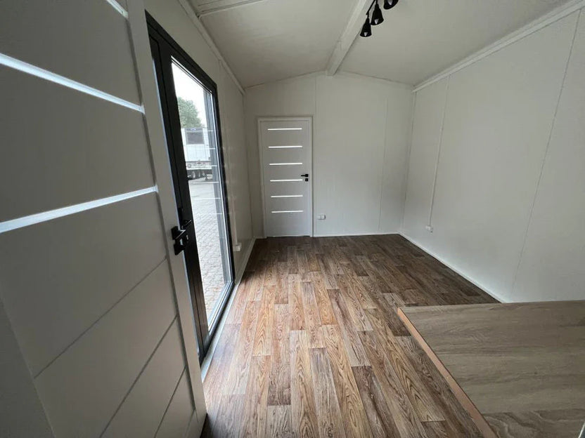 Contenedor de oficina residencial de 24 m2